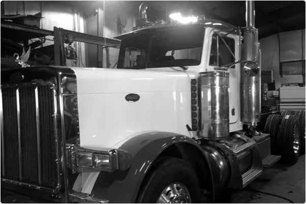 Black and white photo of a semi truck